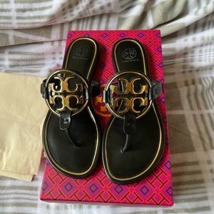Tory Burch Miller sandals size 71/2 in Black and gold